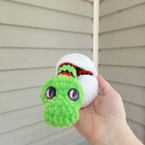 Green Snake Hatchling with Red Stripes