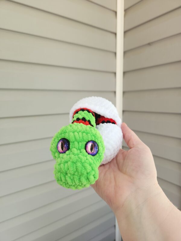 Green Snake Hatchling with Red Stripes