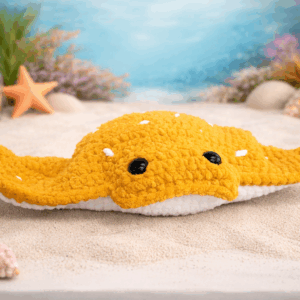 Large Yellow Sting Ray with Two Smaller Sting Rays